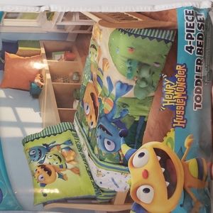 Brand new  Disney 4 piece Toddler Bed Set